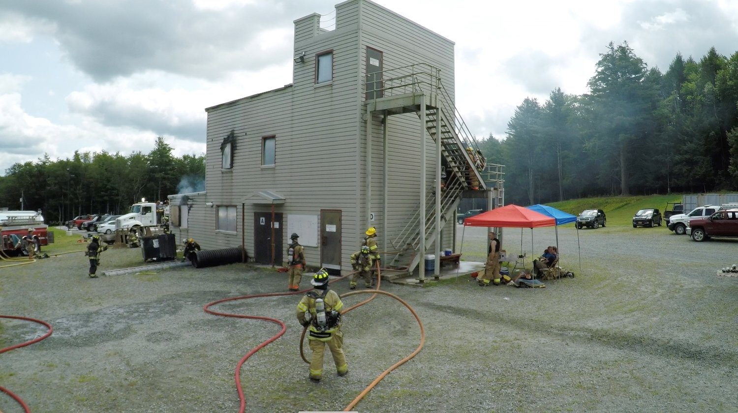 Firefighters practice on a reusable simulator located at the Sullivan County Fire Training Facility in White Lake, NY. The January 2023 program that will teach firematics and Emergency Management Training will be available for area youth.